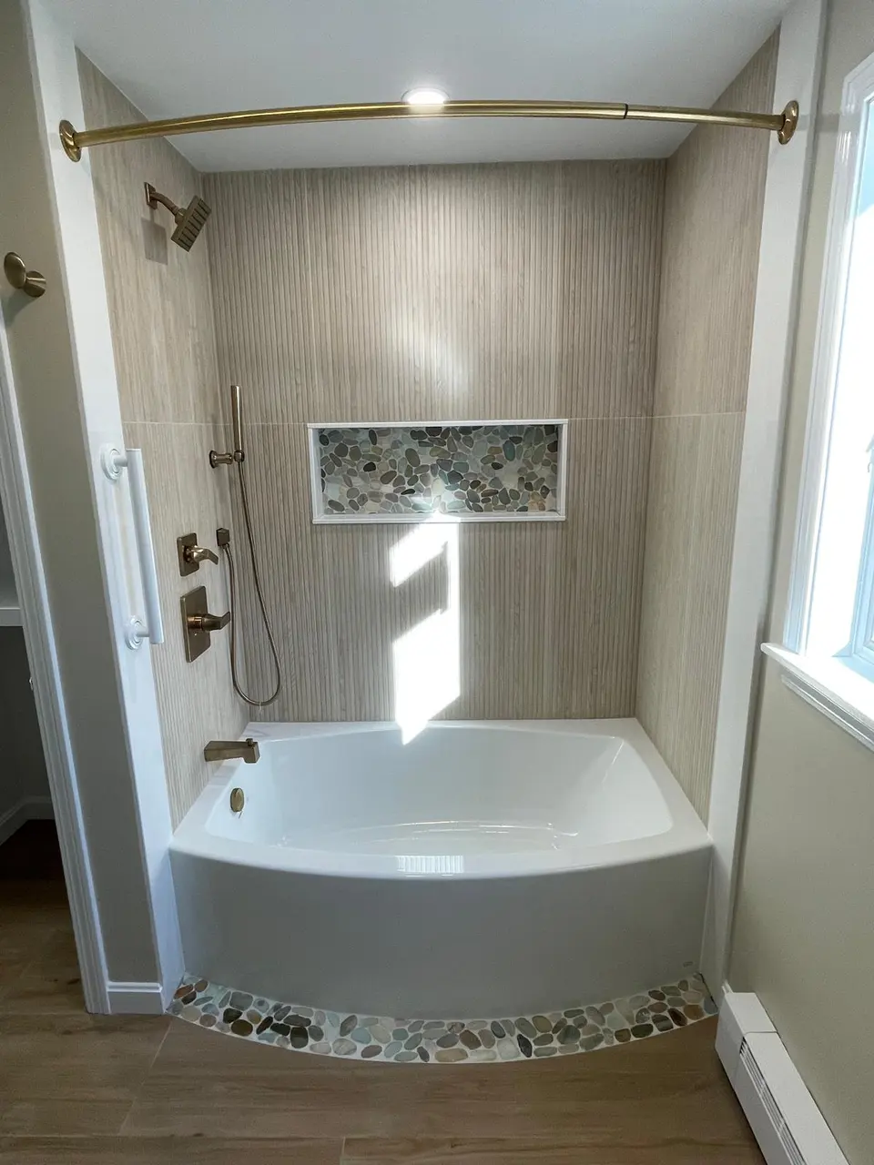 Completed bathroom remodel on Cape Cod by COSTA LVM Home Service