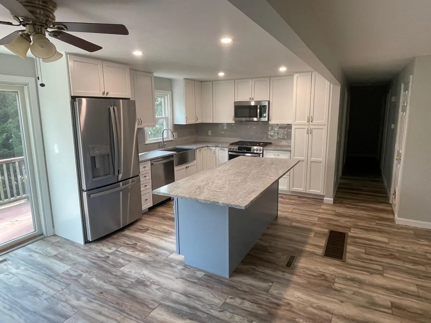 Completed kitchen remodel on Cape Cod by COSTA LVM Home Service